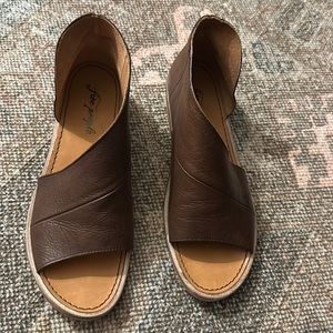 Free people Mont Blanc sandals in brown. Barely worn with No tears or marks.